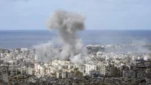 Smoke rises after an Israeli airstrike on Dahiyeh, in the southern suburb of Beirut, Lebanon on Monday. Bilal Hussein/AP