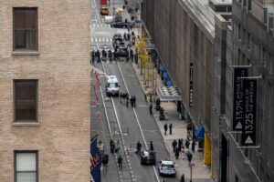 The scene outside the New York Hilton Midtown hotel in the hours after UnitedHealthcare CEO Brian Thompson was shot to death on Dec. 4.Credit...Karsten Moran for The New York Times