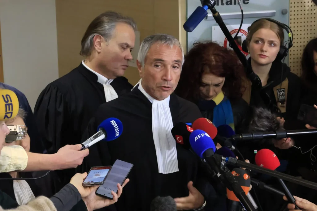 A lawyer for one of the accused, Paul Gontard, speaking to reporters after the verdict in Avignon, France, on Thursday.Credit...Guillaume Horcajuelo/EPA, via Shutterstock