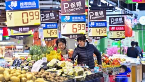 Customers purchase fruit at a supermarket on December 9, 2024 in Qingzhou, Shandong Province of China. Vcg | Visual China Group | Getty Images