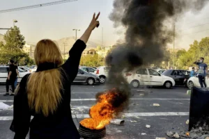 Iranians in Tehran protest the death of 22-year-old Mahsa Amini after she was detained by the morality police in 2022.Middle East Images / via AP