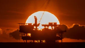 An offshore oil platform is seen at sunset near Huntington Beach, California. David McNew/Getty Images