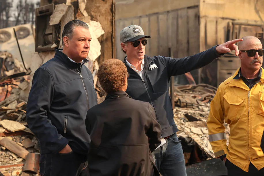 From left, Sen. Alex Padilla (D-California), Los Angeles Mayor Karen Bass and California Gov. Gavin Newsom tour a wildfire-damaged area of the Pacific Palisades neighborhood of Los Angeles on Wednesday. (Allison Dinner/EPA-EFE/Shutterstock)