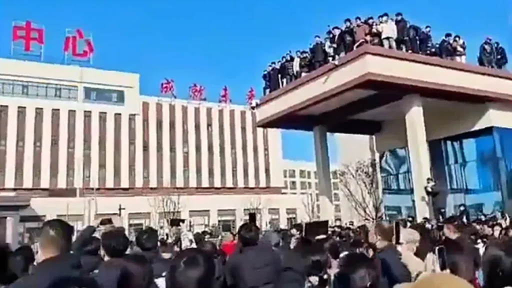 Videos showed protesters outside the Pucheng Vocational Technical School in China's Shaanxi province. Social media