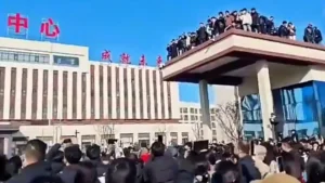 Videos showed protesters outside the Pucheng Vocational Technical School in China's Shaanxi province. Social media