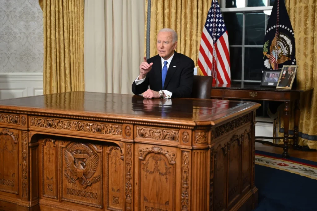 Presiden Biden delivers his farewell address to the nation from the Oval Office. Mandel Ngan/AFP via Getty Images