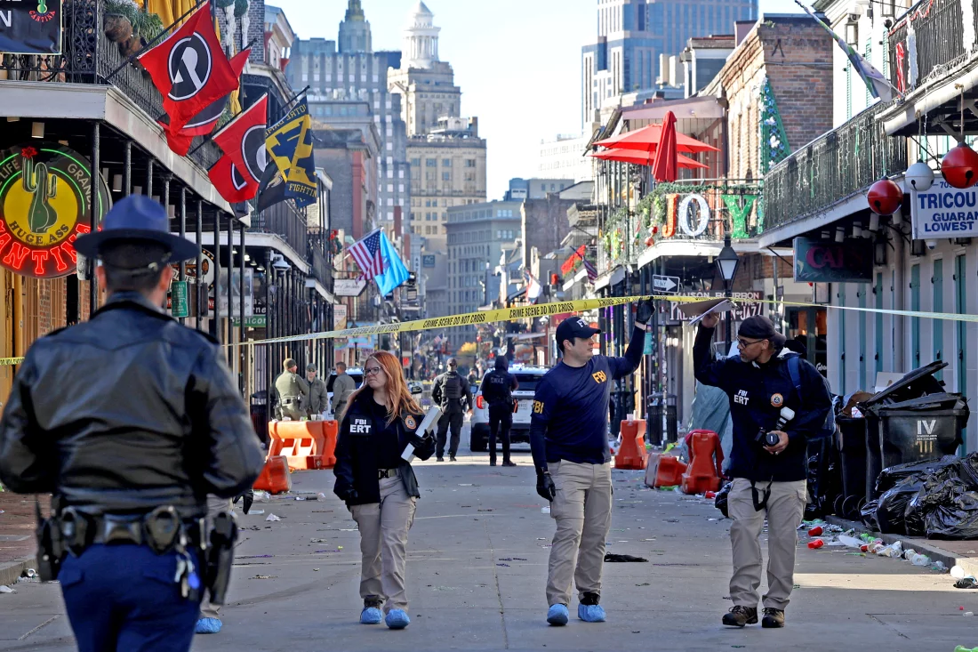 Law enforcement officers from multiple agencies work the scene on Bourbon Street after a person drove a truck into the crowd. Michael DeMocker/Getty Images