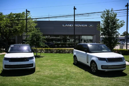 A Land Rover dealership in Houston. The British automaker will suspend exports to the United States this month after a 25 percent tariff on cars went into effect last week.Credit...Ronaldo Schemidt/Agence France-Presse — Getty Images