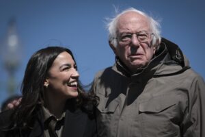 Rep. Alexandria Ocasio-Cortez and Sen. Bernie Sanders bring the sort of vibe that Democrats need in this era of politics as entertainment.(Win McNamee / Getty Images)