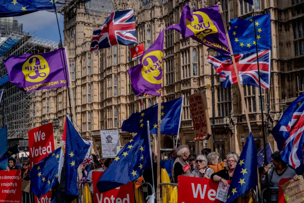 Demonstrators in favor of and against Brexit outside Parliament in 2019 in London.Credit...Andrew Testa for The New York Times