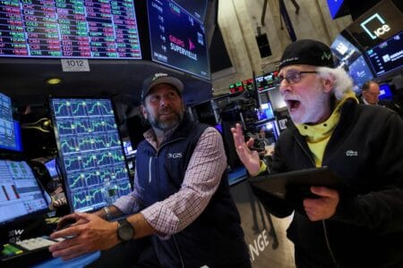 Traders work on the floor at the New York Stock Exchange (NYSE) in New York City, U.S., May 16, 2024. REUTERS/Brendan McDermid/File Photo