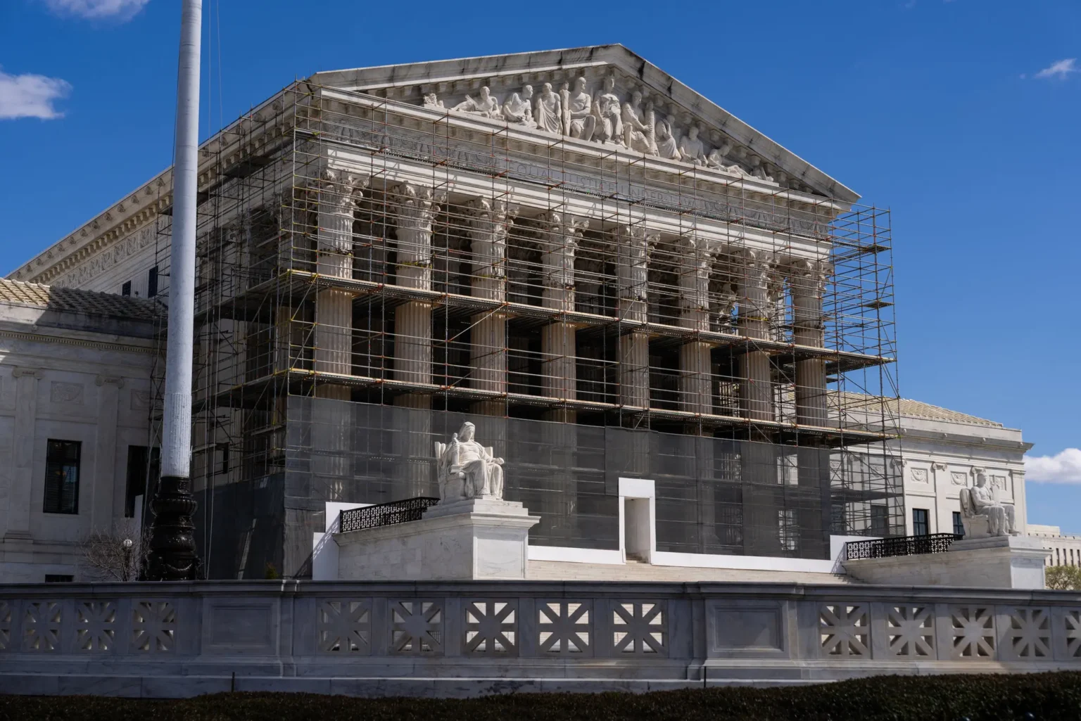 The justices sent the case back to a lower court to consider whether the Alien Enemies Act can be used to deport immigrants accused of being members of the Venezuelan gang. (Eric Lee/The New York Times)