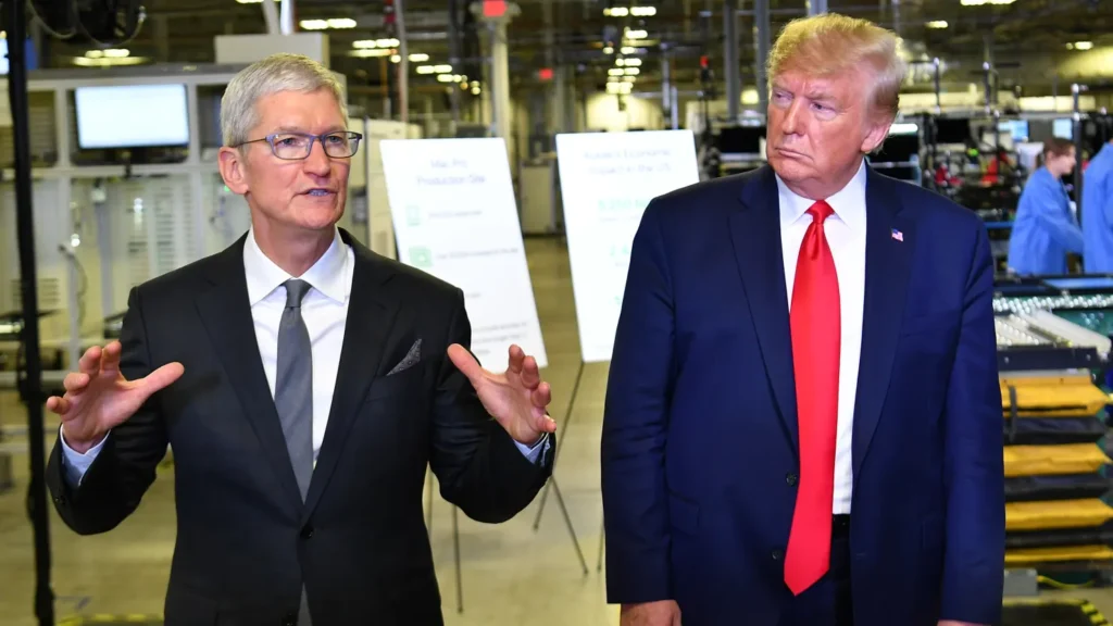 US President Donald Trump (r) and Apple CEO Tim Cook speak to the press during a tour of the Flextronics computer manufacturing facility where Apple’s Mac Pros are assembled in Austin, Texas, on November 20, 2019. (Mandel Ngan/AFP/Getty Images)