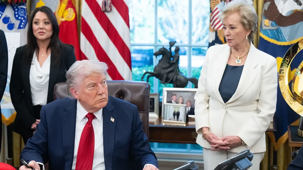 US President Donald Trump signs executive orders relating to higher education institutions, alongside US Secretary of Education Linda McMahon (R), in the Oval Office of the White House in Washington, DC, on April 23, 2025. (Saul Loeb/Afp/Getty Images)