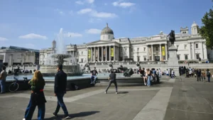 People walk in Trafalgar Square, London, on April 28, 2025. (Adrien Fillon/Nurphoto/Getty Images)