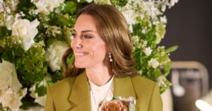 Catherine, Princess of Wales, wore an olive suit by the British designer Victoria Beckham for the occasion. (Shaun James Cox/BFC)