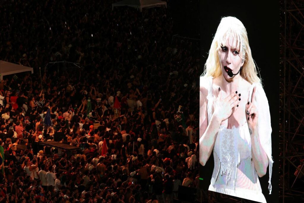 People gather to attend Lady Gaga’s open concert, in Copacabana beach in Rio de Janeiro, Brazil, May 3, 2025. (Photo Credit: PILAR OLIVARES)