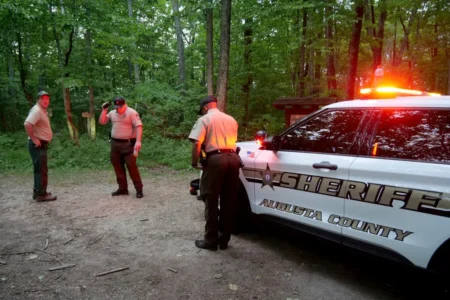 Emergency personnel near Montebello, Va., where a Cessna Citation jet crashed over mountainous terrain in June 2023. (Randall K. Wolf/Associated Press)