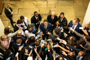 House Republicans, led by Speaker Mike Johnson, center, voted on Thursday to advance a bill that would extend a set of tax cuts enacted in Mr. Trump’s first term. (Haiyun Jiang/The New York Times)