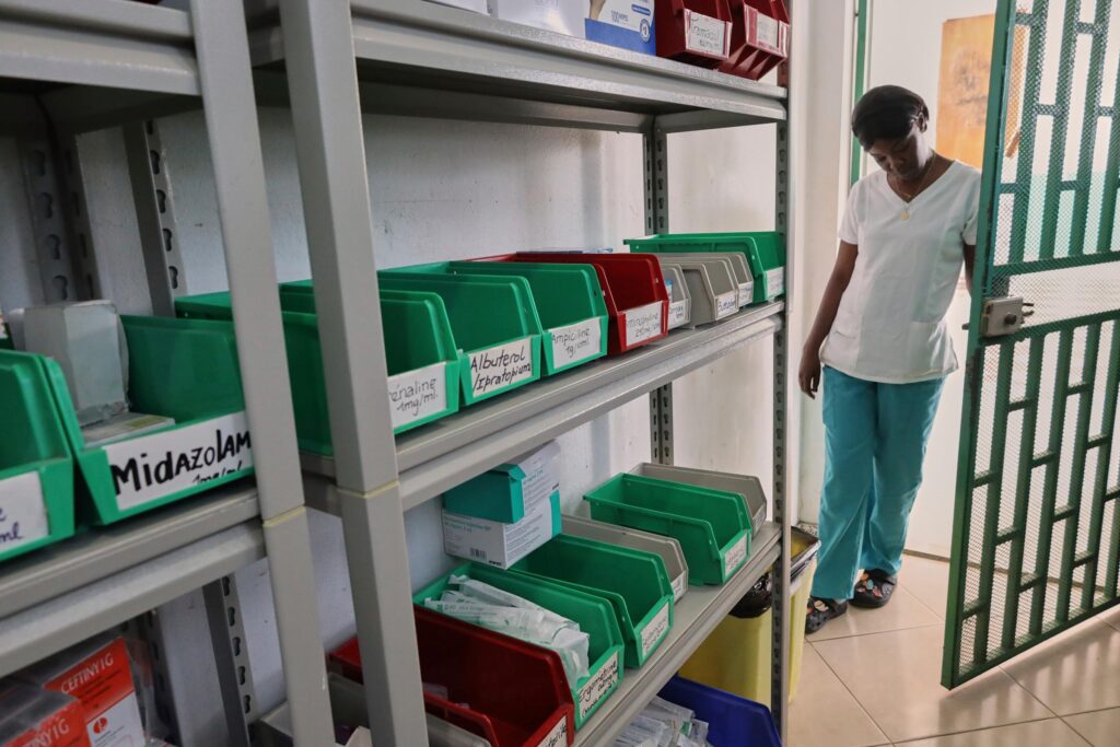 A nurse enters the medicine inventory room at New Hope Hospital in Plaine-du-Nord, Haiti, Wednesday, May 21, 2025. (AP Photo/Patrice Noel)