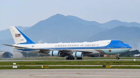 Air Force One landing in a 2023 photo. Boeing has moved up the planned delivery time of two 747 jets to replace the two current jets. But the delivery will still come years after originally scheduled. (Nhac Nguyen/AFP/Getty Images)