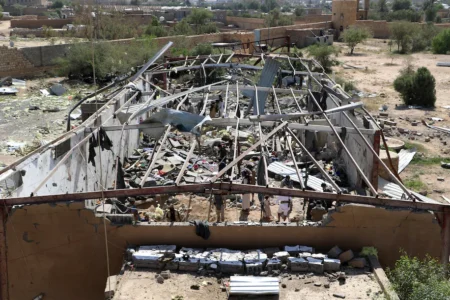 Yemenis inspect the rubble of a building hit by U.S. strikes in the northern province of Saada on April 29, 2025. (AFP/Getty Images)
