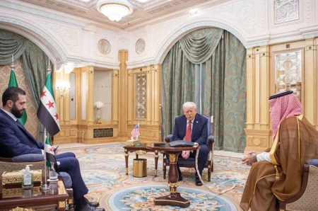 President Trump, accompanied by Saudi Crown Prince Mohammed bin Salman, meets with Syria's President Ahmed al-Sharaa in Riyadh on Wednesday, May 14. (Bandar Al-Jaloud/Getty Images)