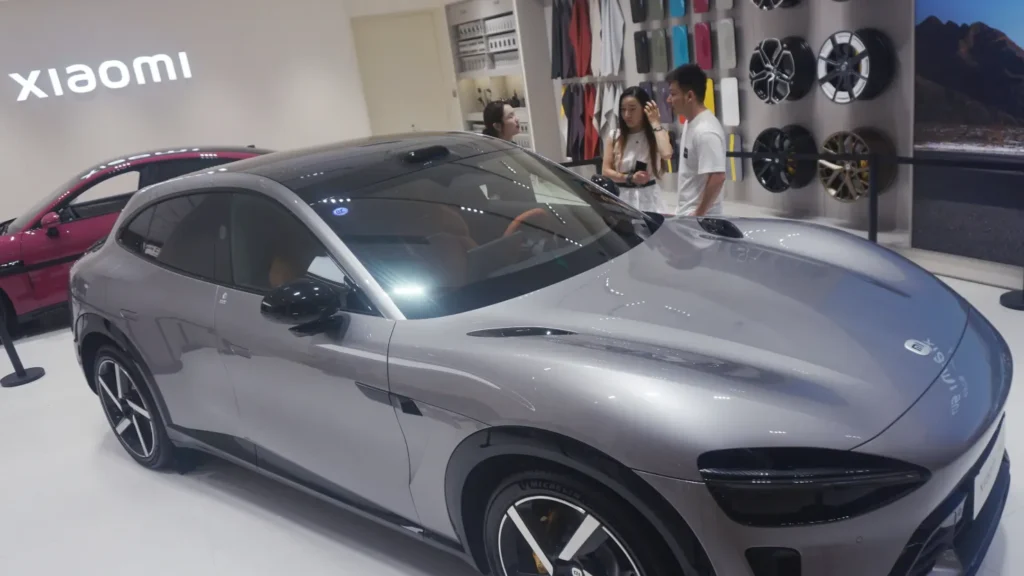 People check out an electric SUV Xiaomi YU7 at a Xiaomi Store in Hangzhou in east China’s Zhejiang province Thursday, June 26, 2025. (Feature China/Future Publishing/Getty Images)