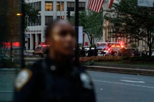 Midtown Office Shooting Leaves 4 Dead, Including Off-Duty Officer; Gunman Dies by Suicide Police respond to a shooting incident in Manhattan on Monday. © John Lamparski/AFP/Getty Images