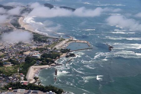 Waves hit Japan's coastline as a tsunami warning up to 3 meters has been issued after the magnitude 8.8 strong earthquake strikes off Kamchatka Peninsula, in Shiogama, Miyagi, Japan on Wednesday. © The Asahi Shimbun/Getty Images