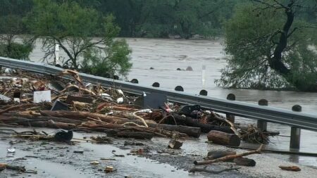 Water rises from severe flooding along the Guadalupe River in the San Antonio area in Texas on Friday. (KSAT)