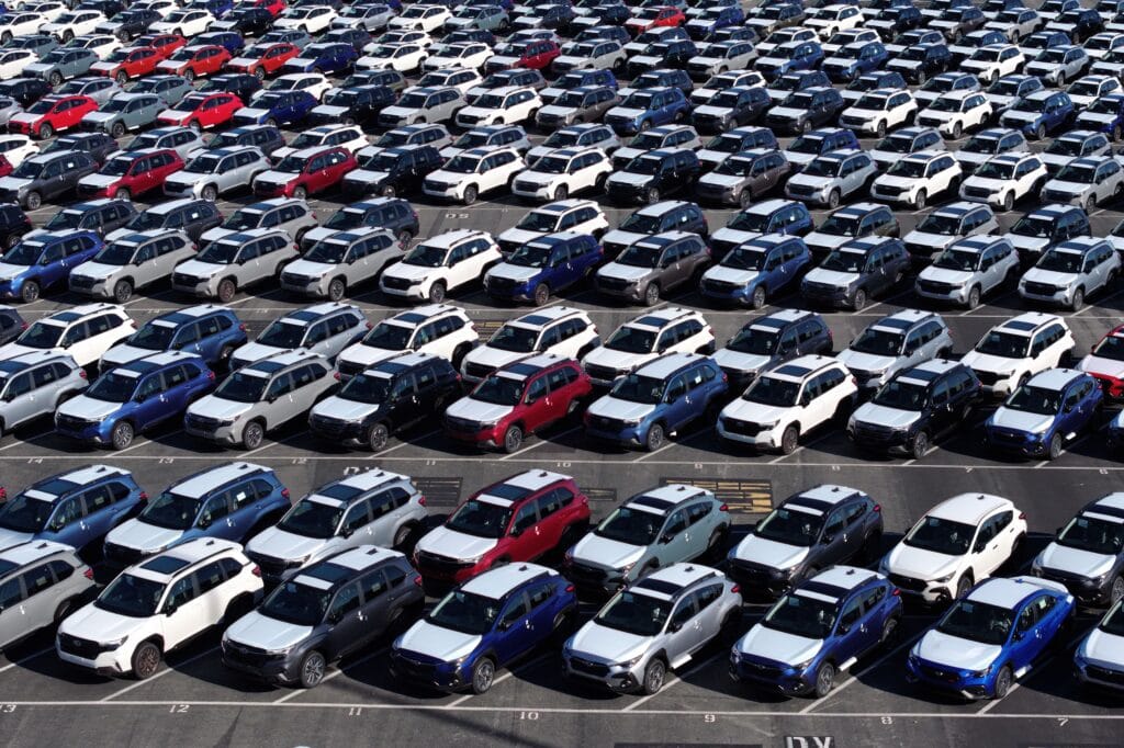 Ford's "Made in America" Approach Backfires Amid Trump's Tariffs 3 New Subaru cars sit in a storage lot at in Richmond, California. Imported vehicles like these now face a 25% tariffs. © Justin Sullivan/Getty Images
