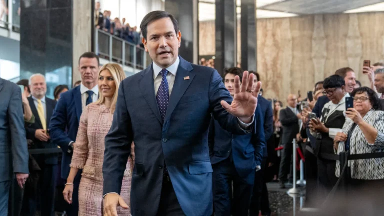 Secretary of State Marco Rubio greets State Department staff at the Eisenhower Executive Office Building on Tuesday in Washington, DC. © Jacquelyn Martin/AP Photo