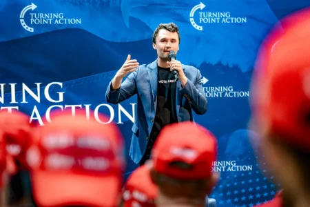 Conservative commentator Charlie Kirk, founder of Turning Point USA, speaks during a meeting on the campus of the University of Arizona in Tucson on Oct. 17, 2024. © Olivier Touron:AFP via Getty Images