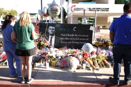 Arizonans mourn Turning Point USA Founder Charlie Kirk outside of the Turning Point USA headquarters in Phoenix on Sept. 12, 2025. © Charly Triballeau/AFP via Getty Images