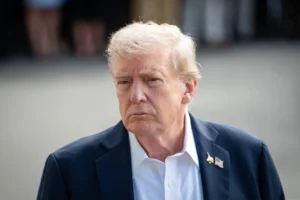 President Donald Trump speaks to reporters as he departs for the Ryder Cup golf competition in New York, from the White House on Sept. 26, 2025. © Madalina Kilroy/The Epoch Times
