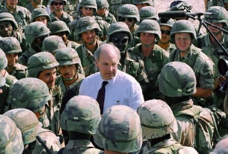 Cheney talks with members of the Army's 3rd Armored Division in Iraq in 1991. © Bill Haber/AP