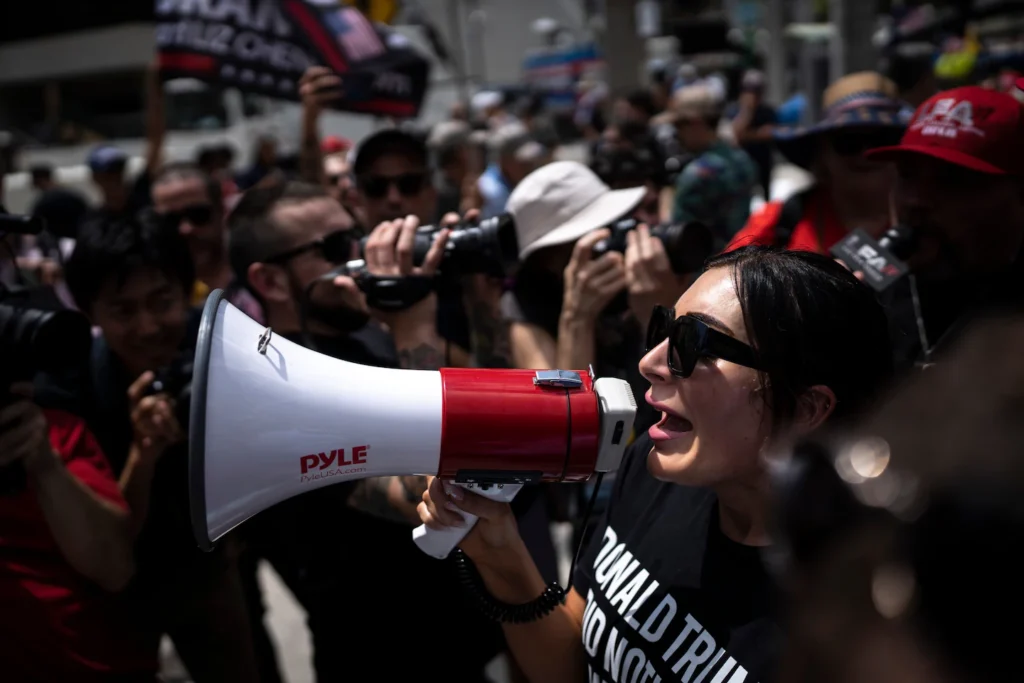 Far-right activist Laura Loomer protests the indictment of Donald Trump outside federal court in Miami in 2023. © Thomas Simonetti/For The Washington Post