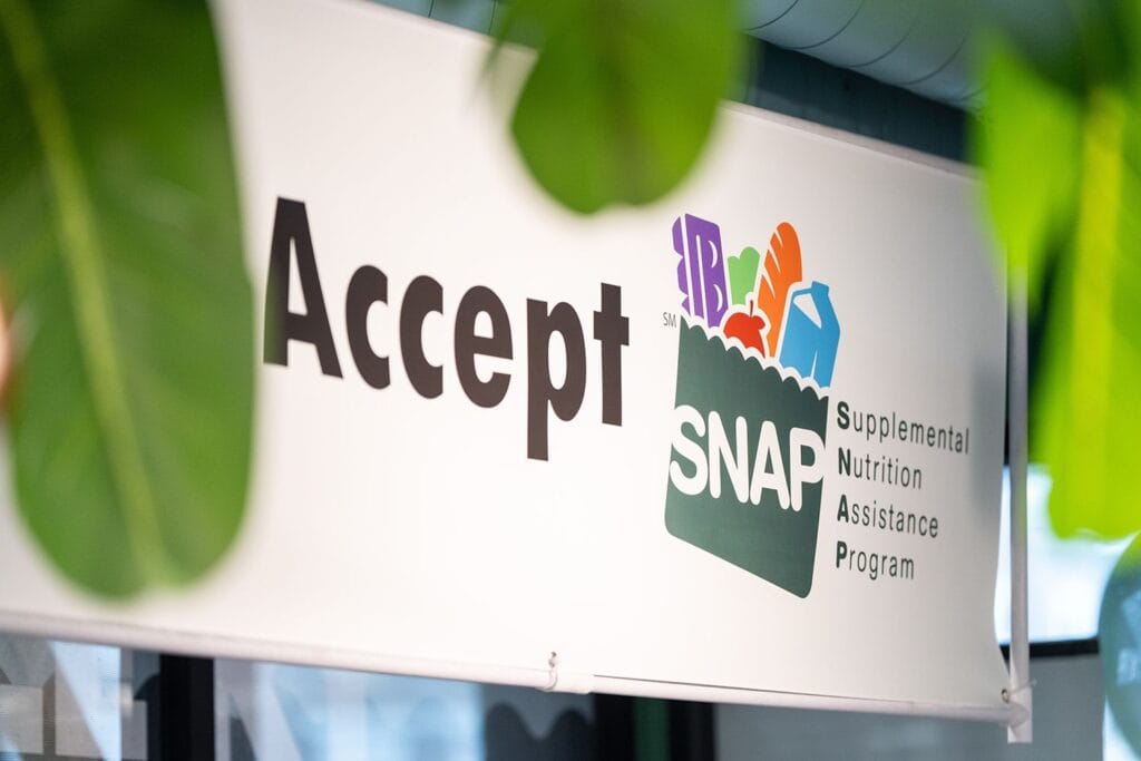 Judge Orders Trump Administration to Fully Fund SNAP Benefits for November Supplemental Nutritional Assistance Program (SNAP) signage at a grocery store in Dorchester, Massachusetts. © Mel Musto/Bloomberg via Getty