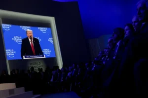Members of the Trump administration and other attendees listen to U.S. President Donald Trump's remarks during the 56th annual World Economic Forum (WEF), in Davos, Switzerland, on Wednessday. © Jonathan Ernst/Reuters