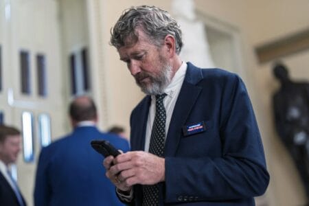 Rep. Thomas Massie, R-Ky., a libertarian-leaning deficit hawk, walks to the House chamber as Republicans work to push President Donald Trump's signature bill of tax breaks and spending cuts across the finish line (AP Photo/J. Scott Applewhite)