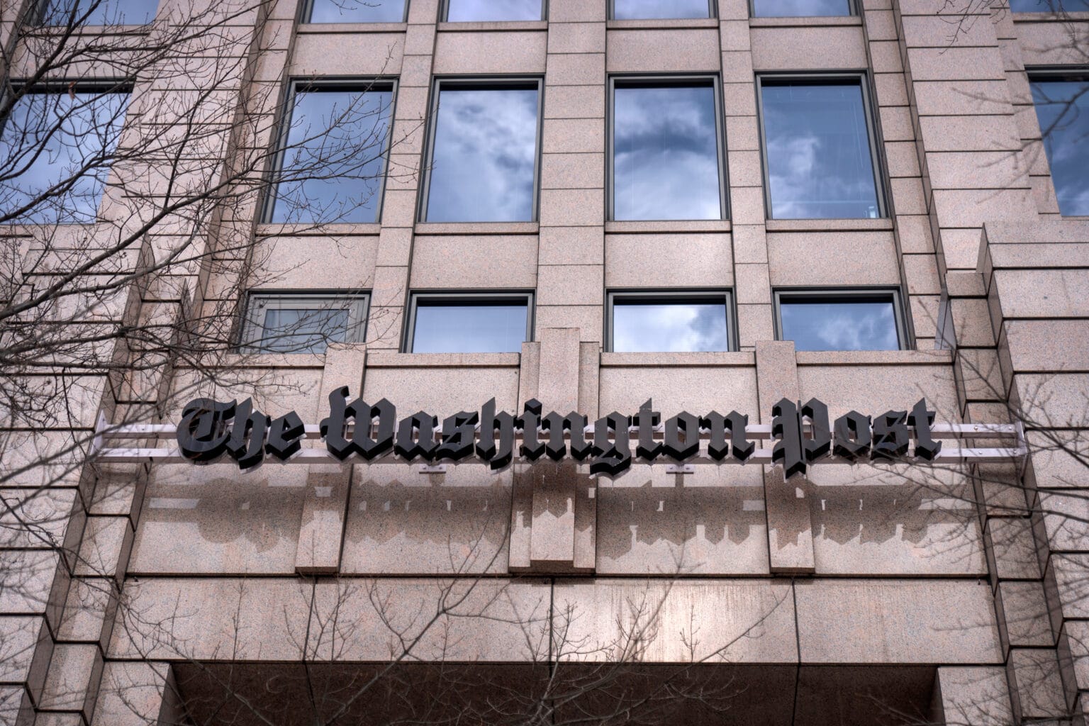 A sign for The Washington Post is seen at the company's offices Jan. 26, 2026, in Washington. (Mark Schiefelbein/AP)