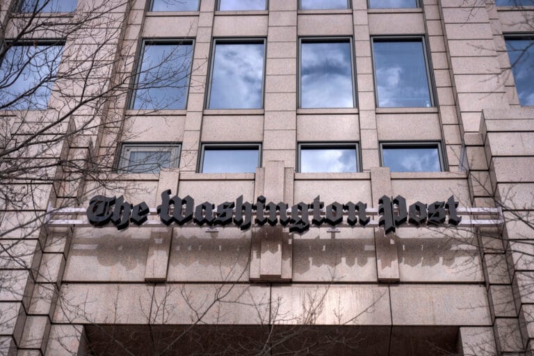 A sign for The Washington Post is seen at the company's offices Jan. 26, 2026, in Washington. (Mark Schiefelbein/AP)