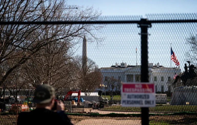 Secret Service is getting the fortified White House that past presidents resisted A pedestrian looks through a fence at ongoing construction in Lafayette Square on the north side of the White House in March. (Al Drago/For The Washington Post)