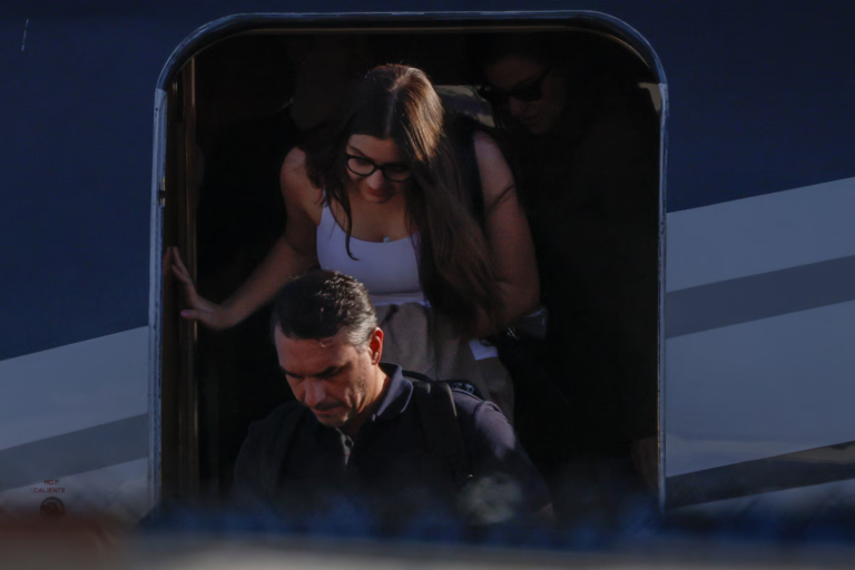 Flávio Bolsonaro lands in Miami after fleeing Brazil following election loss Flávio Bolsonaro disembarks from a plane Wednesday after arriving at an airport near Miami. (Eva Marie Uzcategui/Reuters)